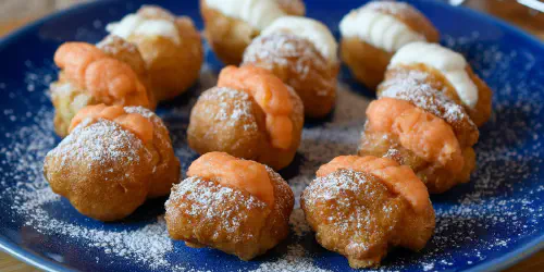 Cómo hacer buñuelos tradicionales y caseros rellenos con crema de calabaza o nata montada. Receta de Otoño deliciosa y que triunfa en casa.